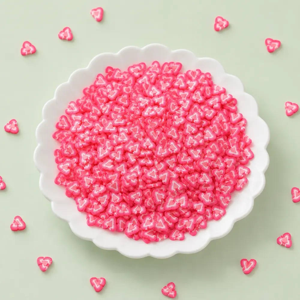 Pink candy polymer clay mix on white plate