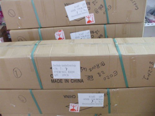 Sealed and strapped cartons prepared for shipment